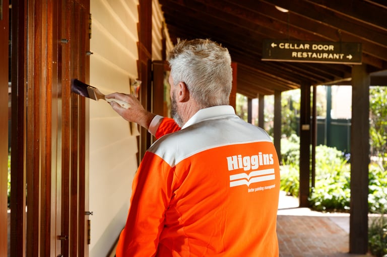 Painter painting commercial property