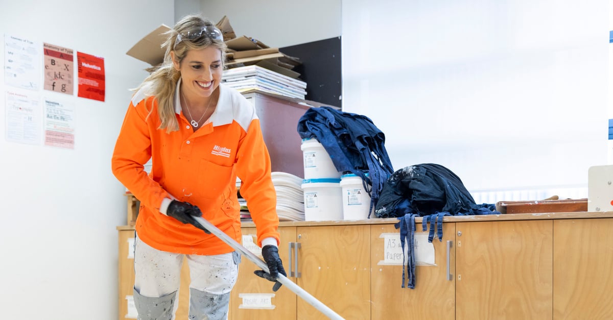 woman-in-higgins-workwear-painting-a-floor-with-a-roller