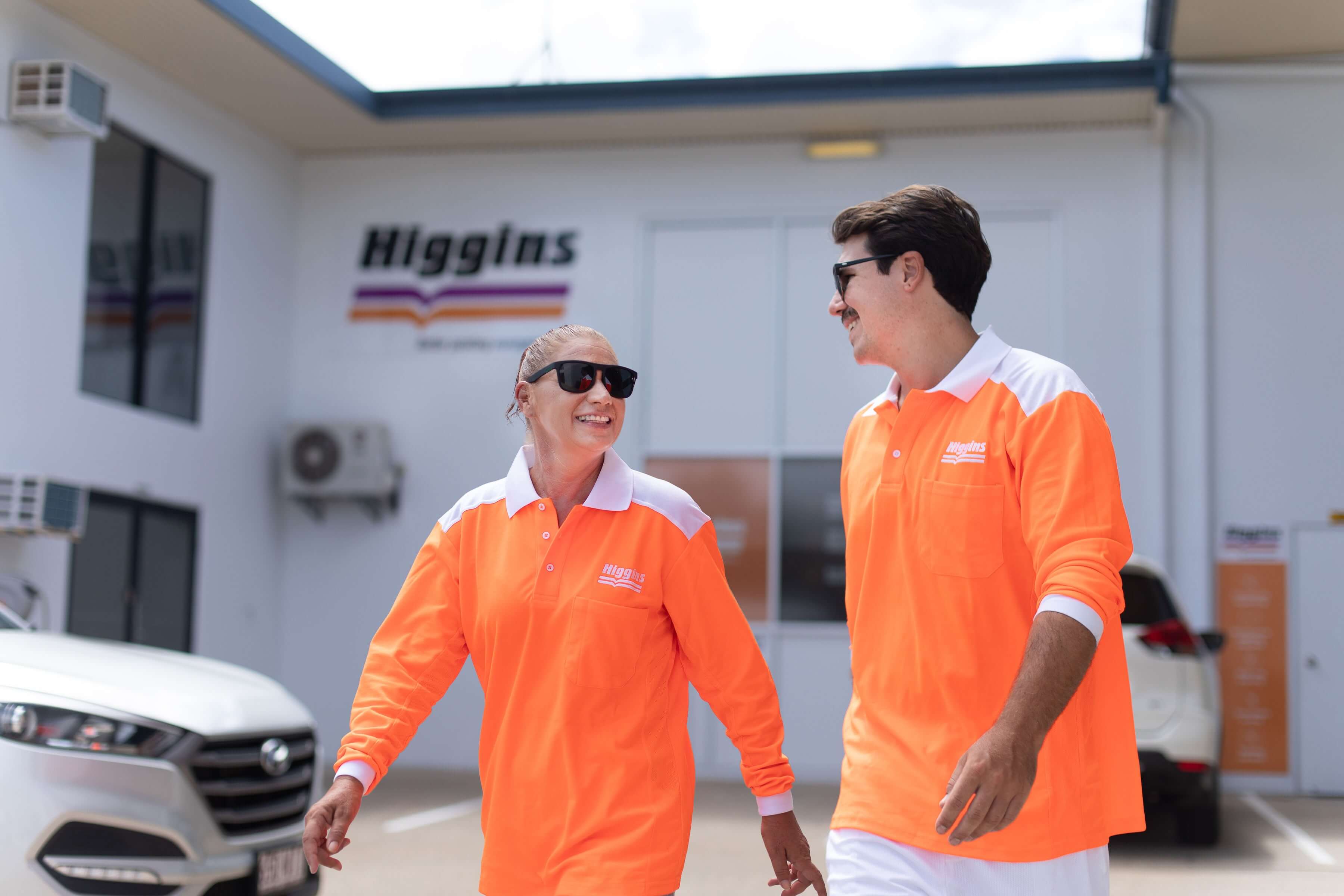 Higgins painters walking together and laughing